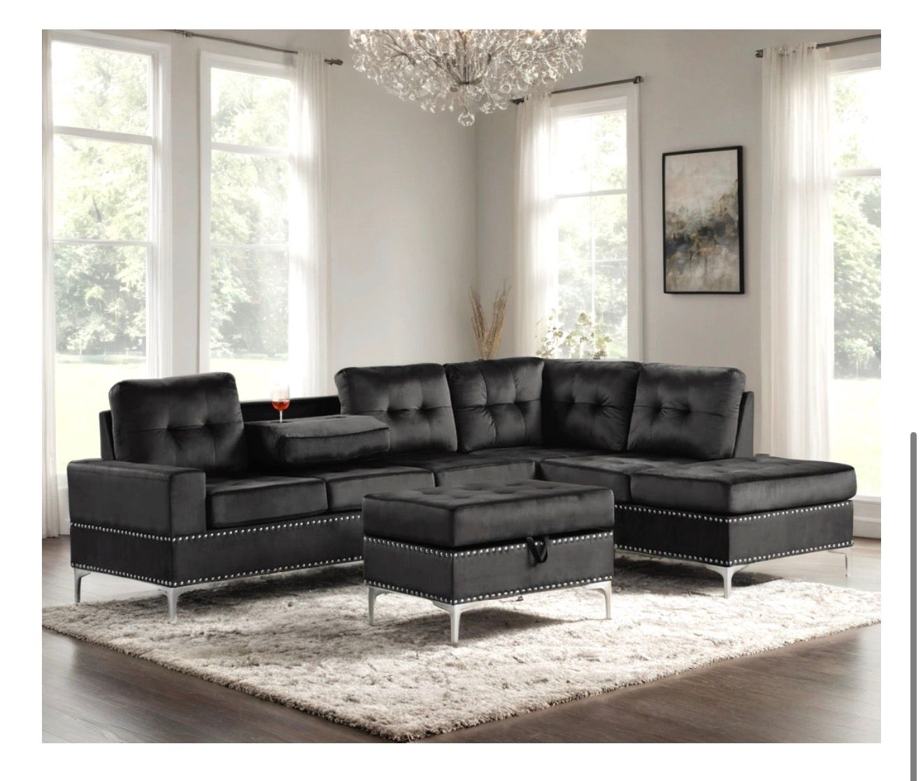 Anserra Black Reversible Sectional + Ottoman Set